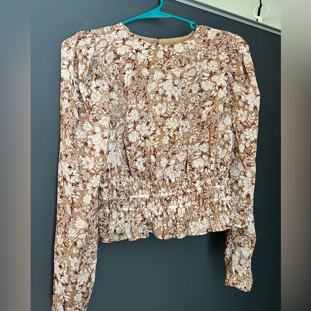 Express metallic floral top.